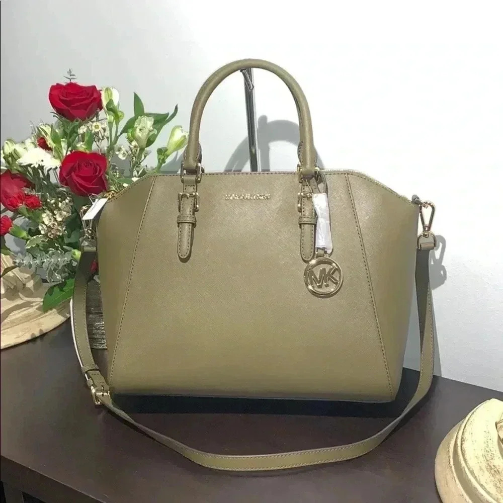 Michael Kors Ciara Duffle Solid olive green color